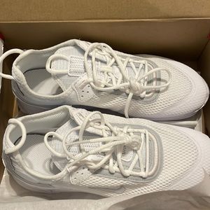 Size 5Y White Nike React Shoes. Never worn, brand new still in box.